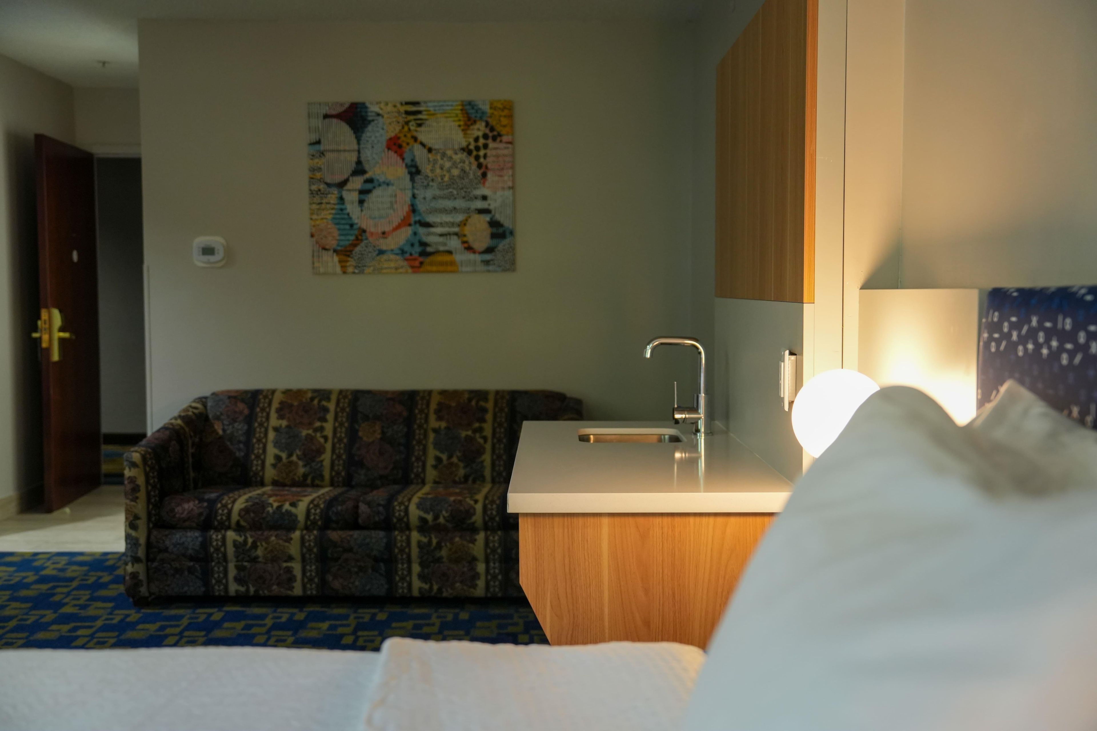 Pillowtop beds, desk, cribs (free), WiFi (free)