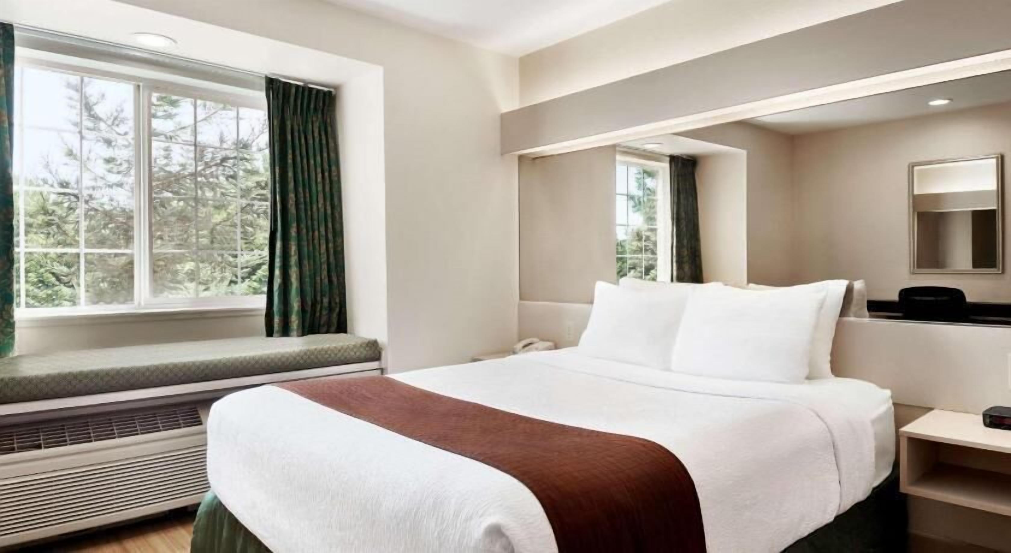Desk, free WiFi, bed sheets, alarm clocks