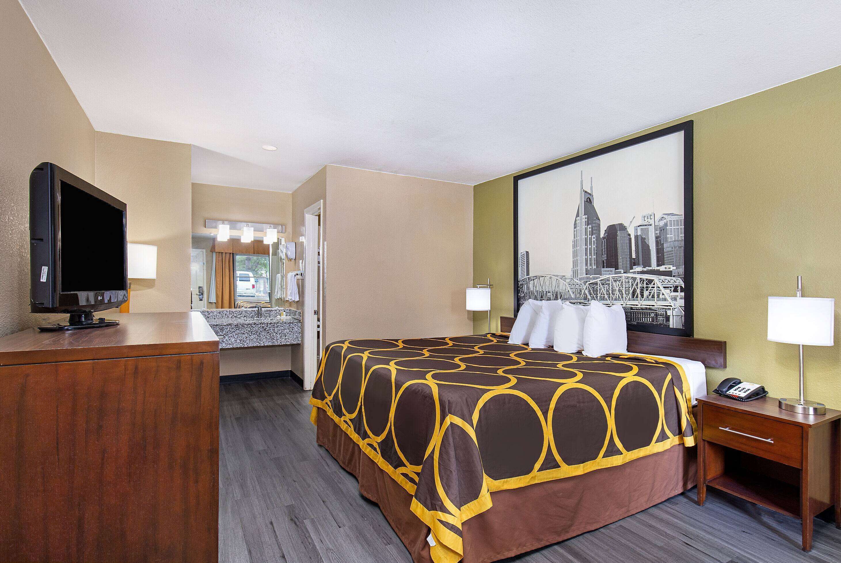 Room, 1 King Bed, Non Smoking | Desk, blackout drapes, iron/ironing board, free cribs/infant beds