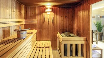 A wooden sauna with benches, a bench seat, and a bench with a backrest.