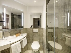 Shower, eco-friendly toiletries, hair dryer, towels