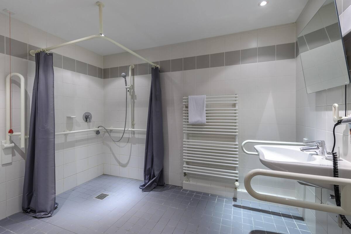 family room, multiple beds (new concept) | desk, blackout curtains, soundproofing, iron/ironing board