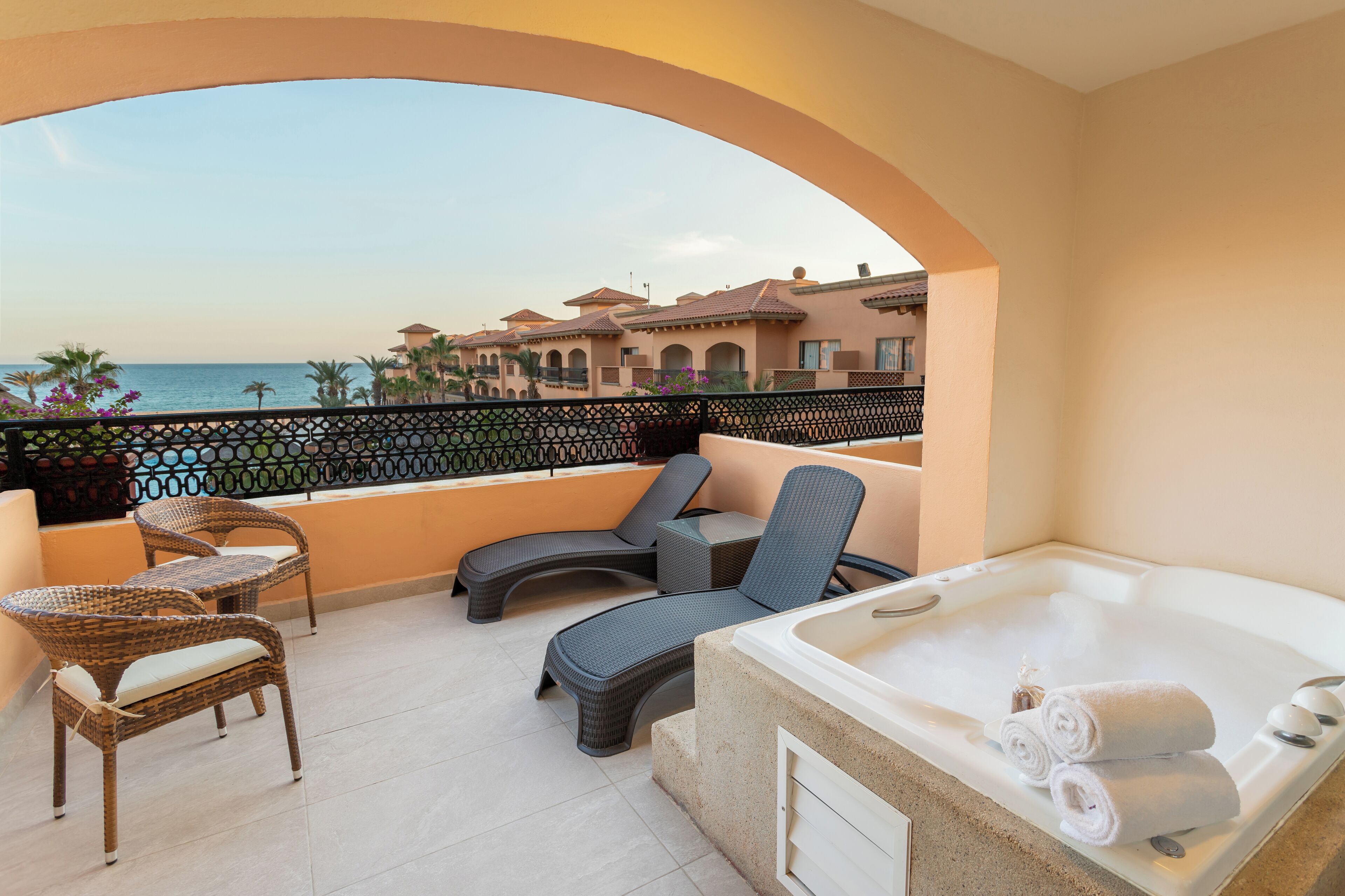 Deluxe Room Balcony, 1 King Bed, Jetted Tub, Ocean View | Free minibar, in-room safe, desk, blackout drapes