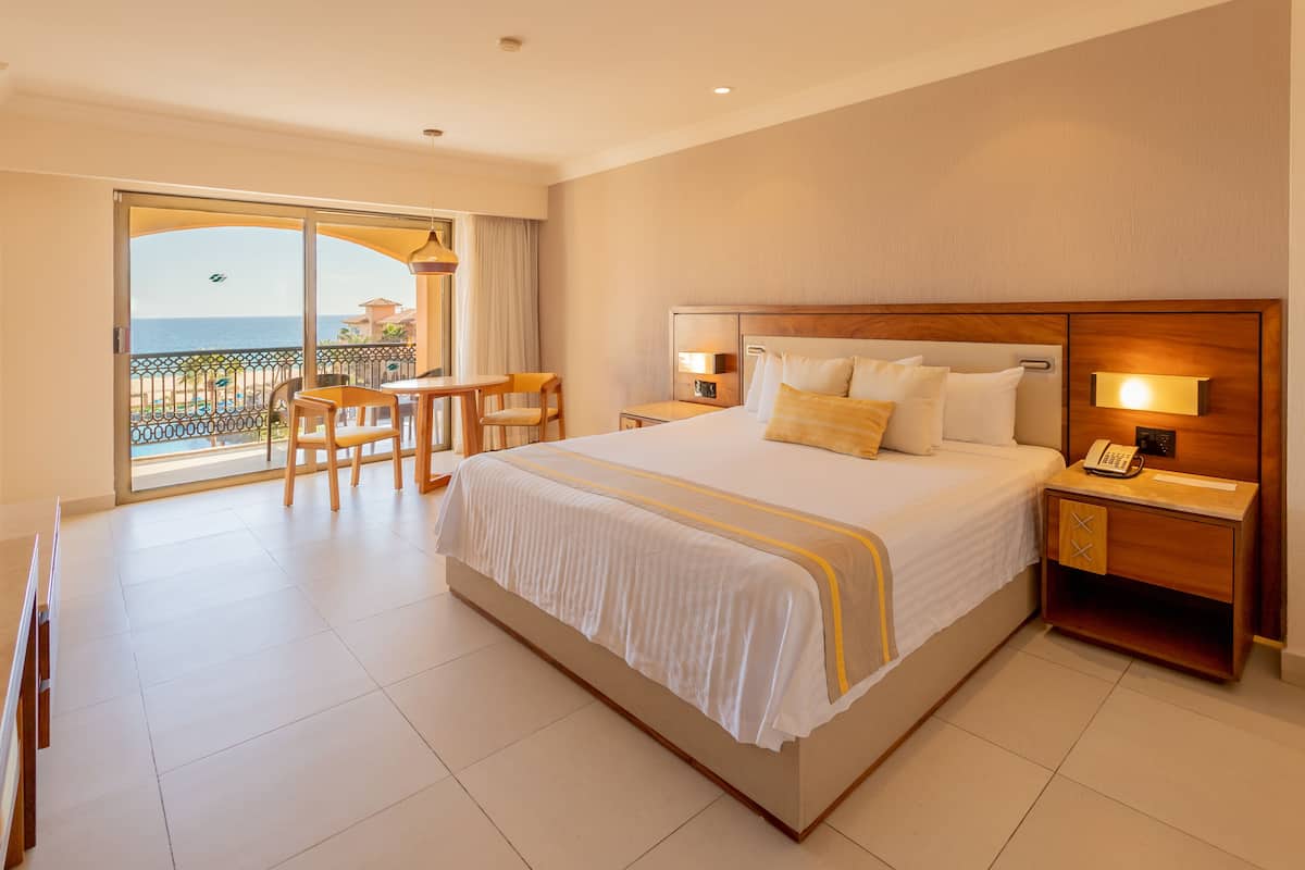 Deluxe Room, Balcony, Ocean View | Free minibar, in-room safe, desk, blackout drapes