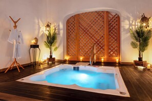 Spa, bain de vapeur, soins du corps, massage aux pierres chaudes
