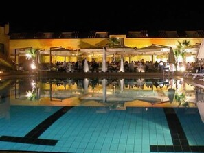 Outdoor pool, open 9:00 AM to 7:00 PM, pool umbrellas, sun loungers