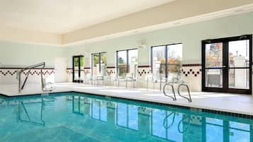 Indoor pool, open 6:00 AM to 10:00 PM, pool loungers