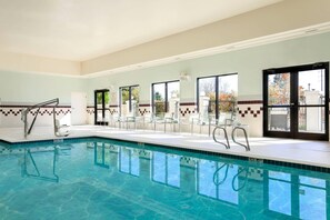 Indoor pool, open 6:00 AM to 10:00 PM, pool loungers