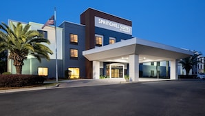 A modern hotel with a prominent sign reading "Springhill Suites by Marriott". - SpringHill Suites by Marriott Savannah I-95 (Savannah)