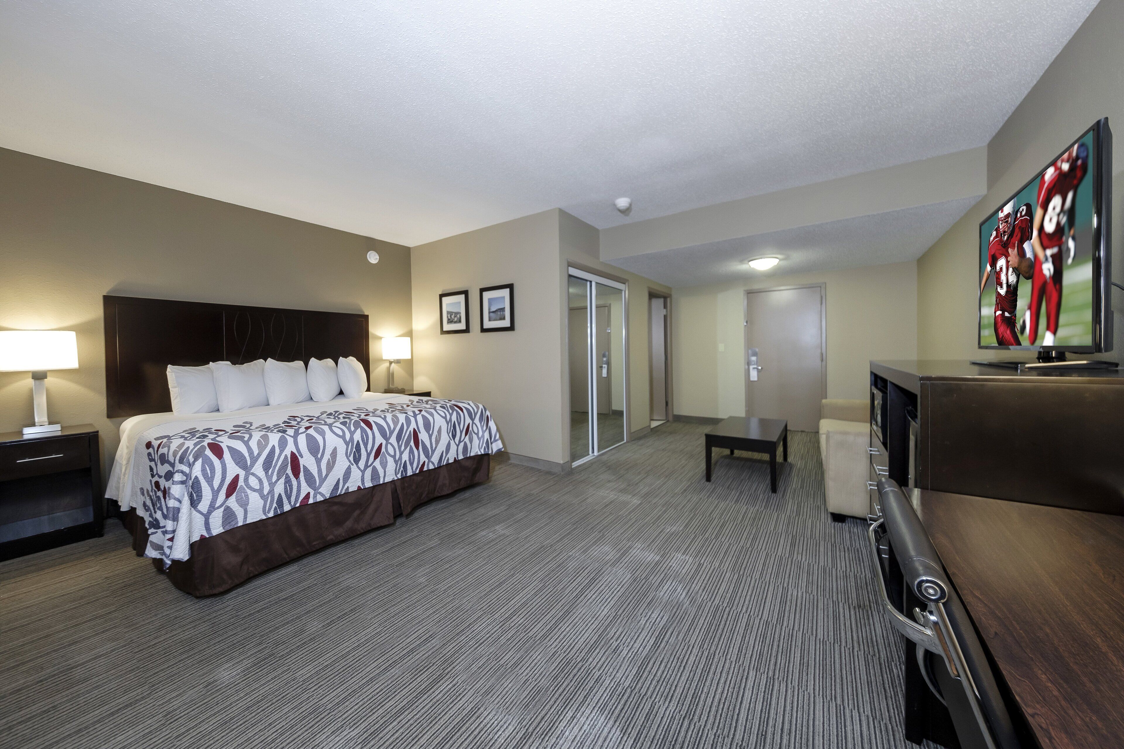 suite, 1 king bed, accessible, non smoking | desk, iron/ironing board, free cots/infant beds, rollaway beds