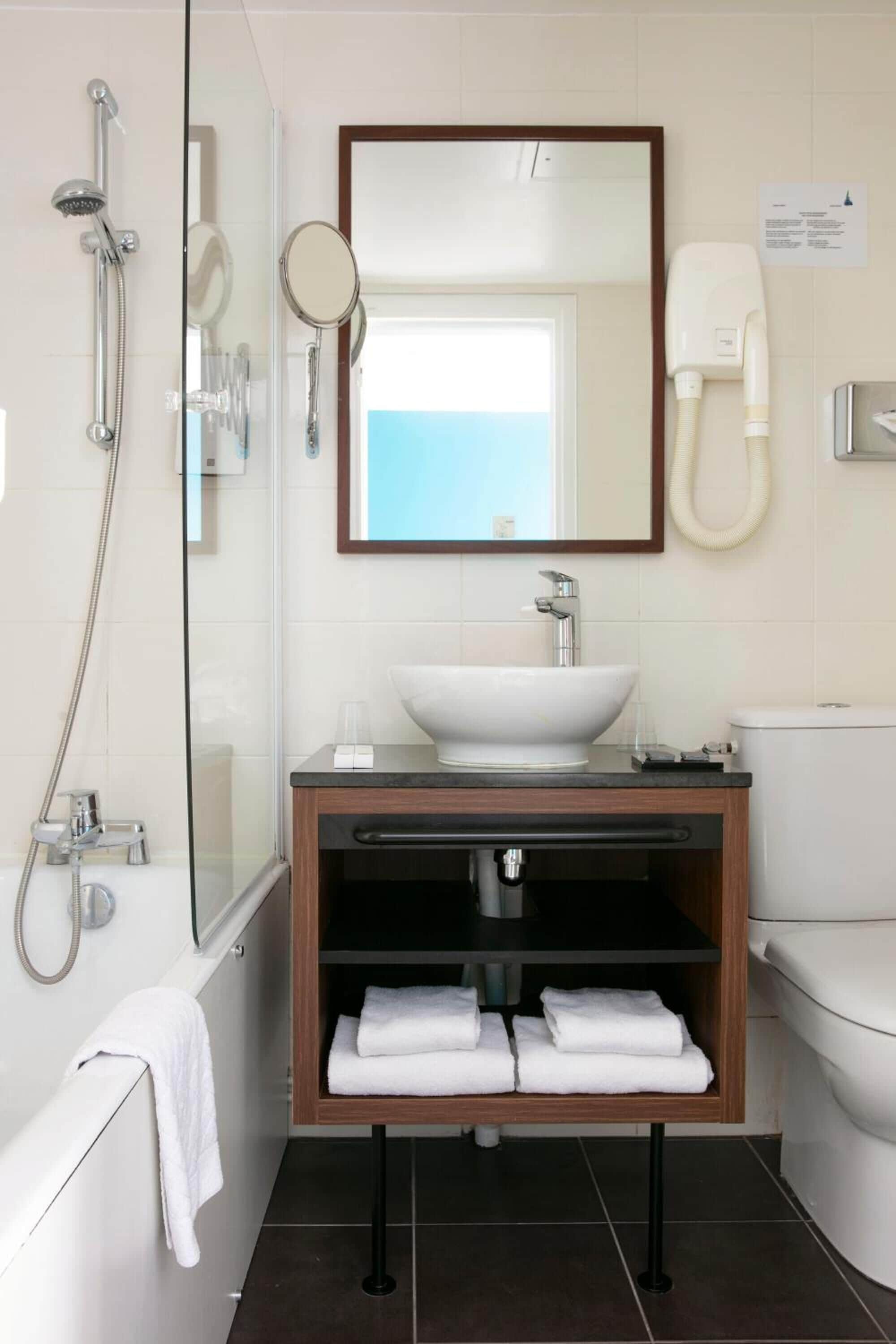 free toiletries, hair dryer, towels, shampoo