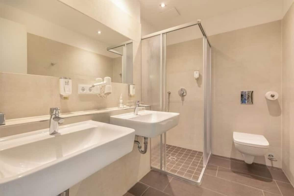 Bathroom | Shower, free toiletries, hair dryer, towels