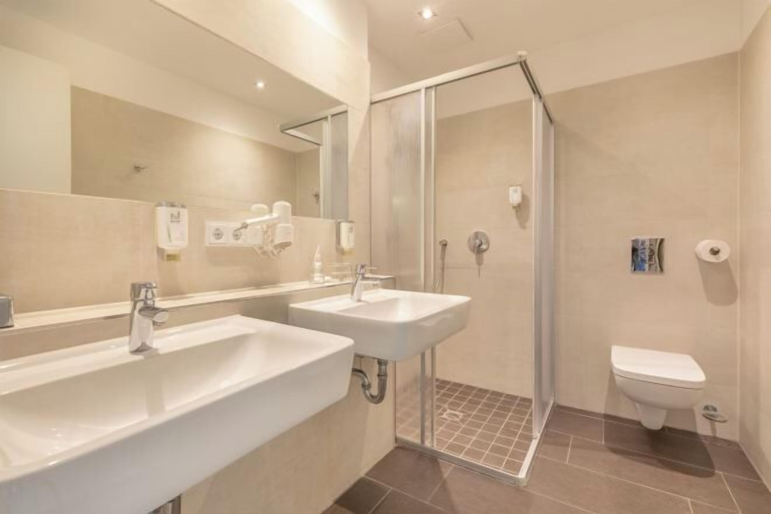 Bathroom | Shower, free toiletries, hair dryer, towels
