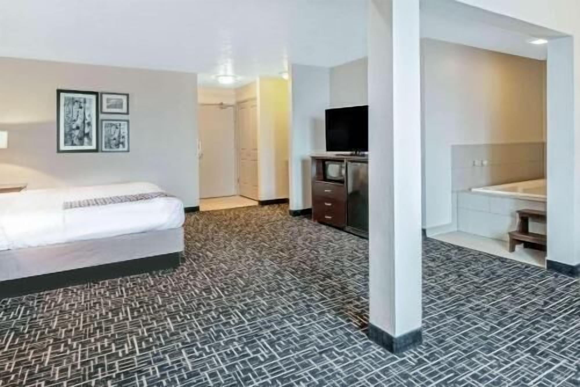 Premium bedding, pillowtop beds, desk, blackout drapes