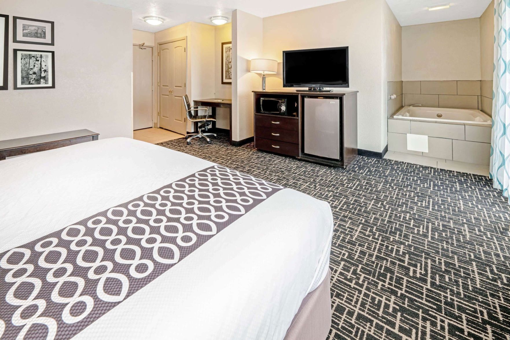 Premium bedding, pillowtop beds, desk, blackout drapes