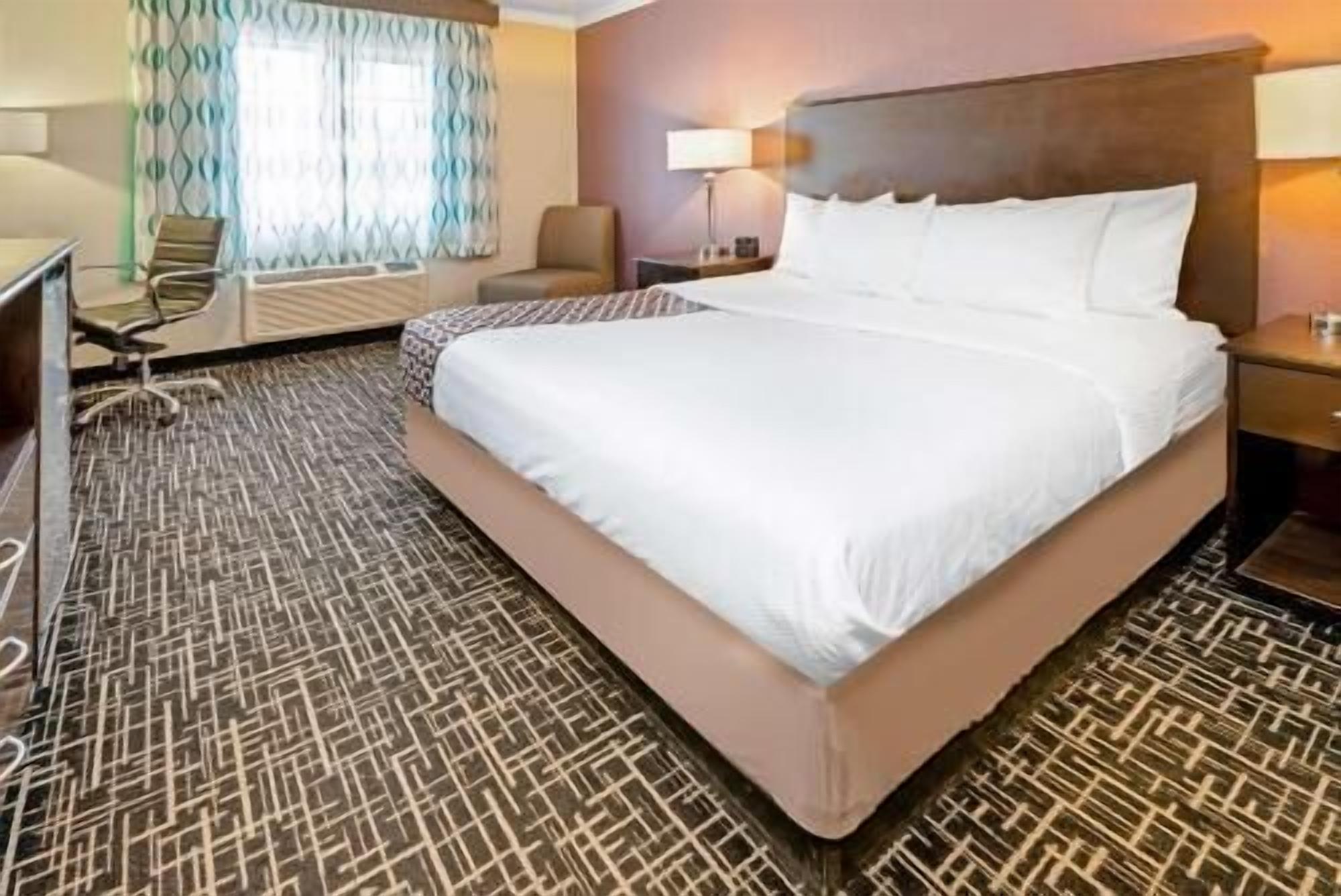 Premium bedding, pillowtop beds, desk, blackout drapes