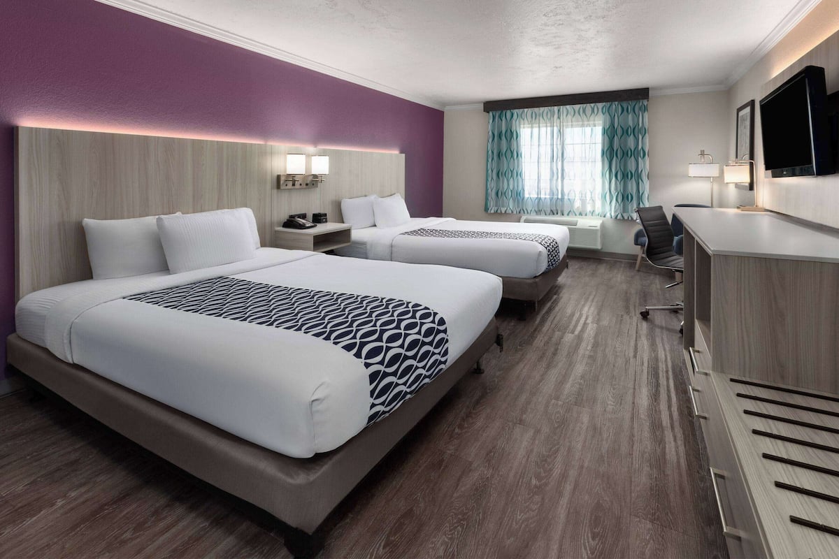 Premium bedding, pillowtop beds, desk, blackout drapes