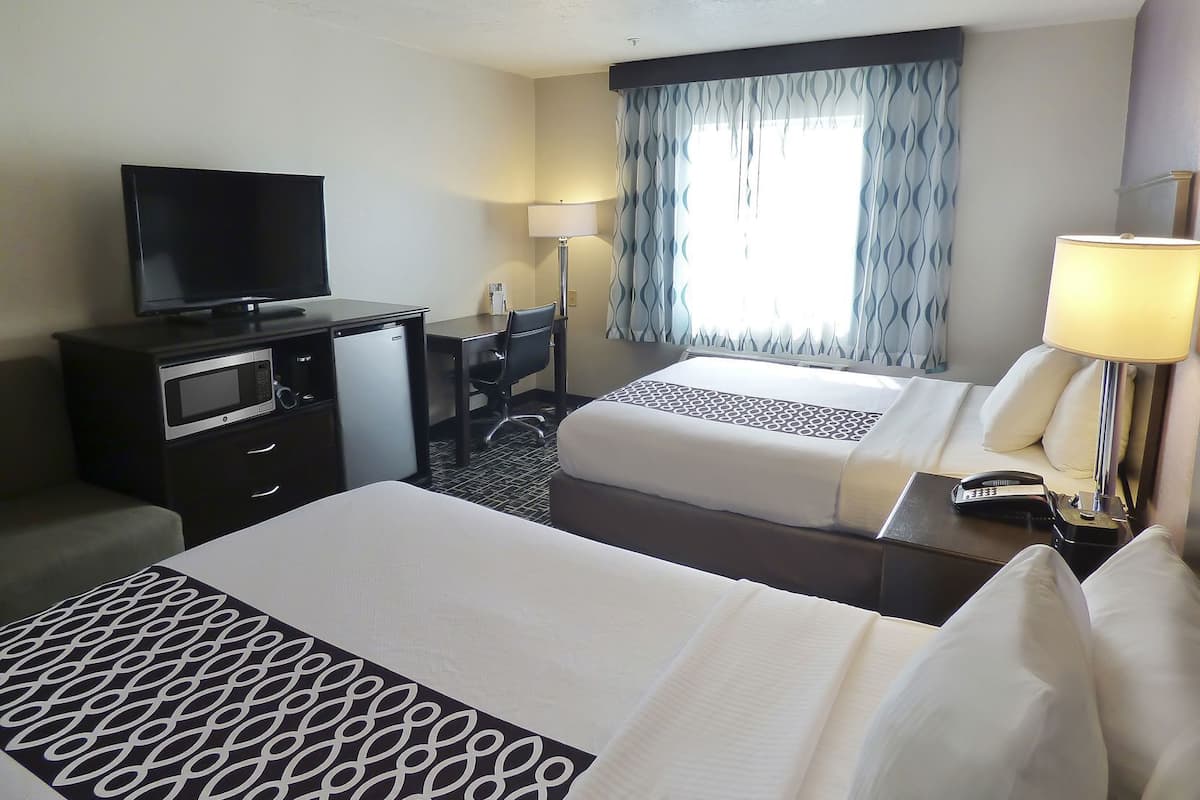 Premium bedding, pillowtop beds, desk, blackout drapes