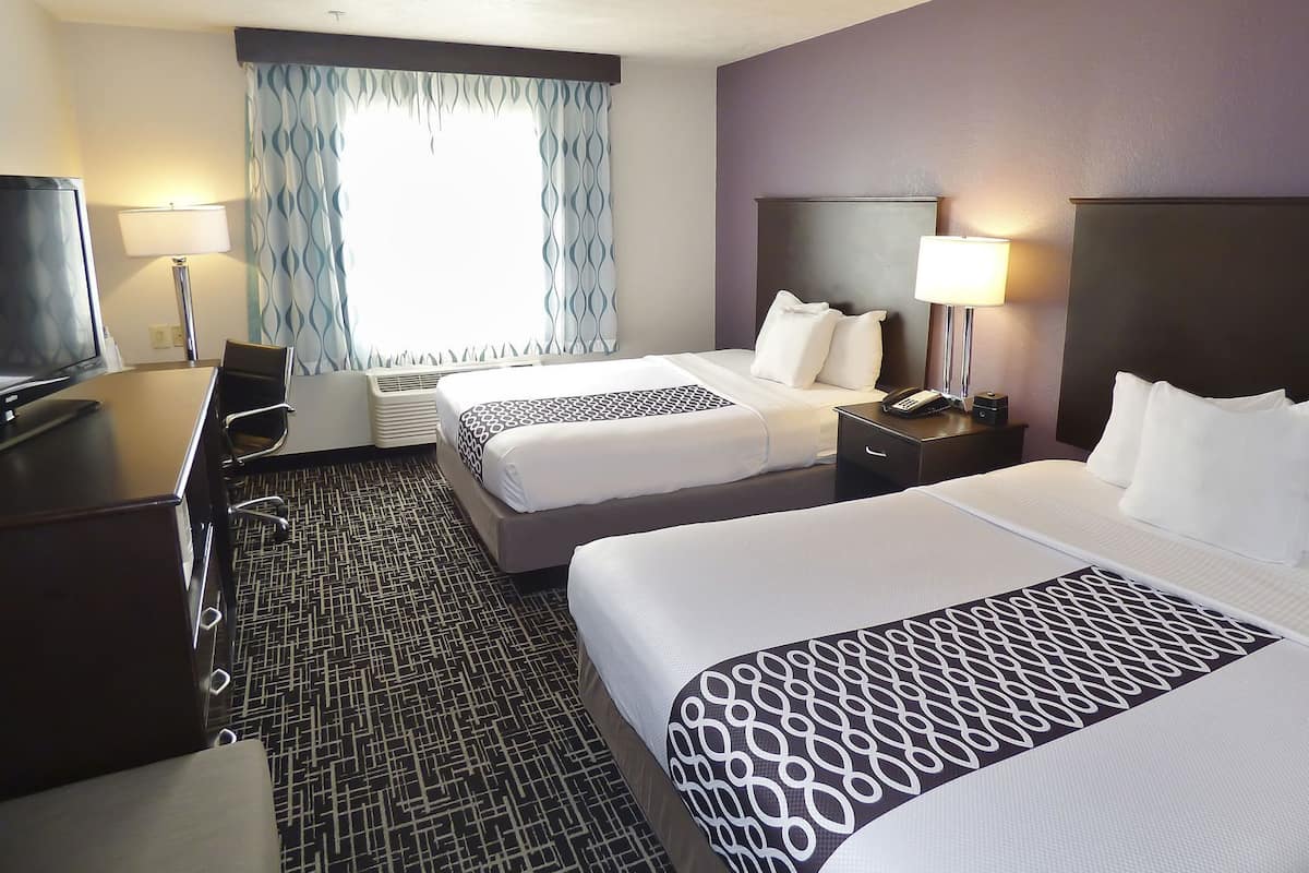 Premium bedding, pillowtop beds, desk, blackout drapes