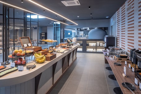 Free daily buffet breakfast. Holiday Inn Express and Suites Lisbon Principe Real by IHG