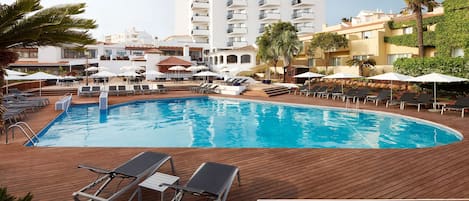 Indoor pool, seasonal outdoor pool, pool umbrellas, pool loungers