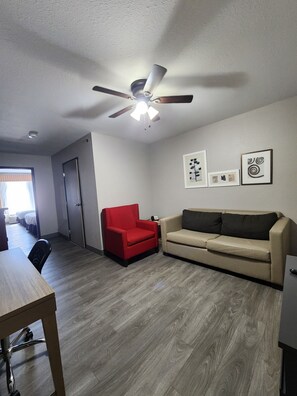 Suite, 1 Bedroom, Non Smoking | Living area | 48-inch TV with cable channels
