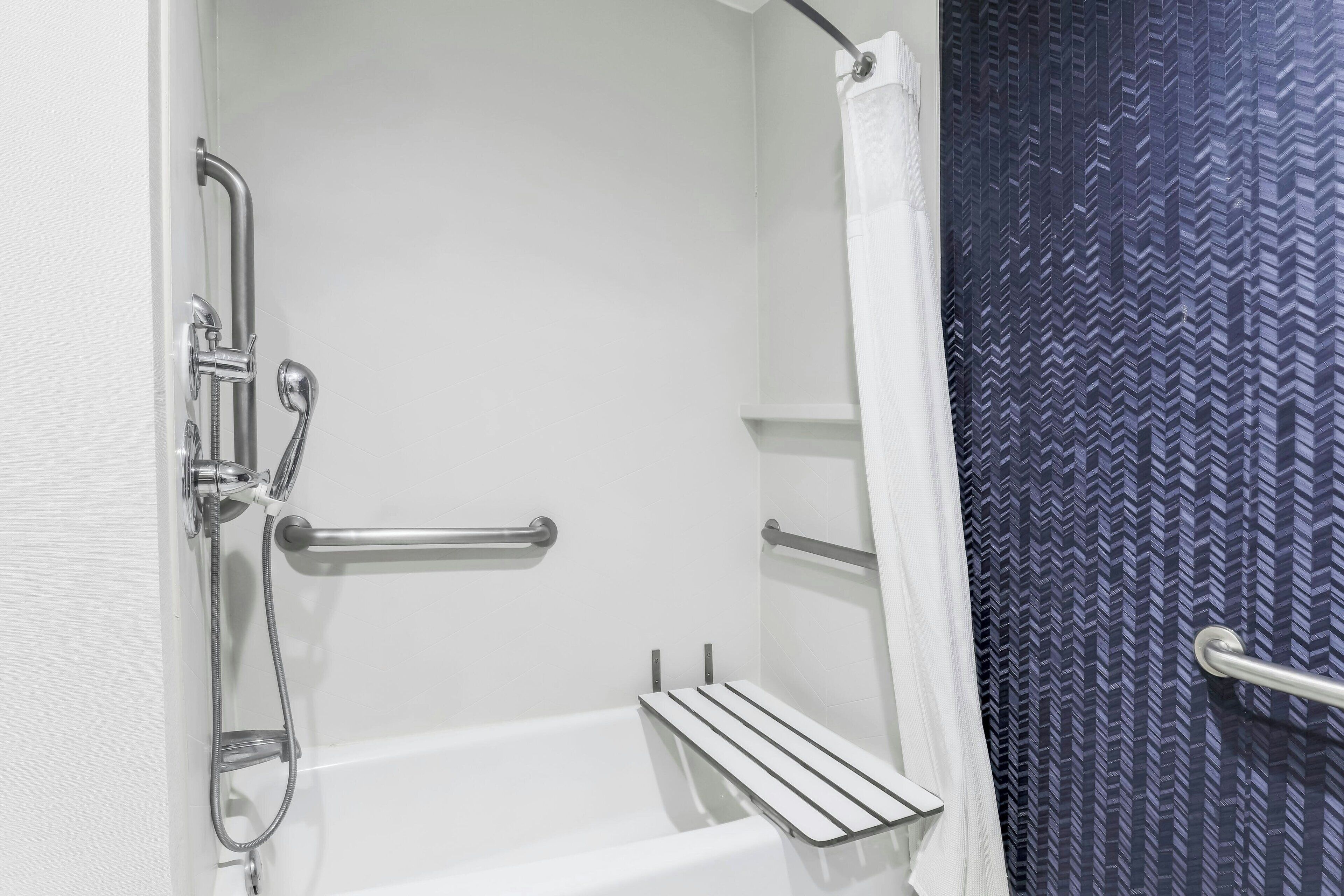 combined shower/bathtub, free toiletries, hair dryer, towels