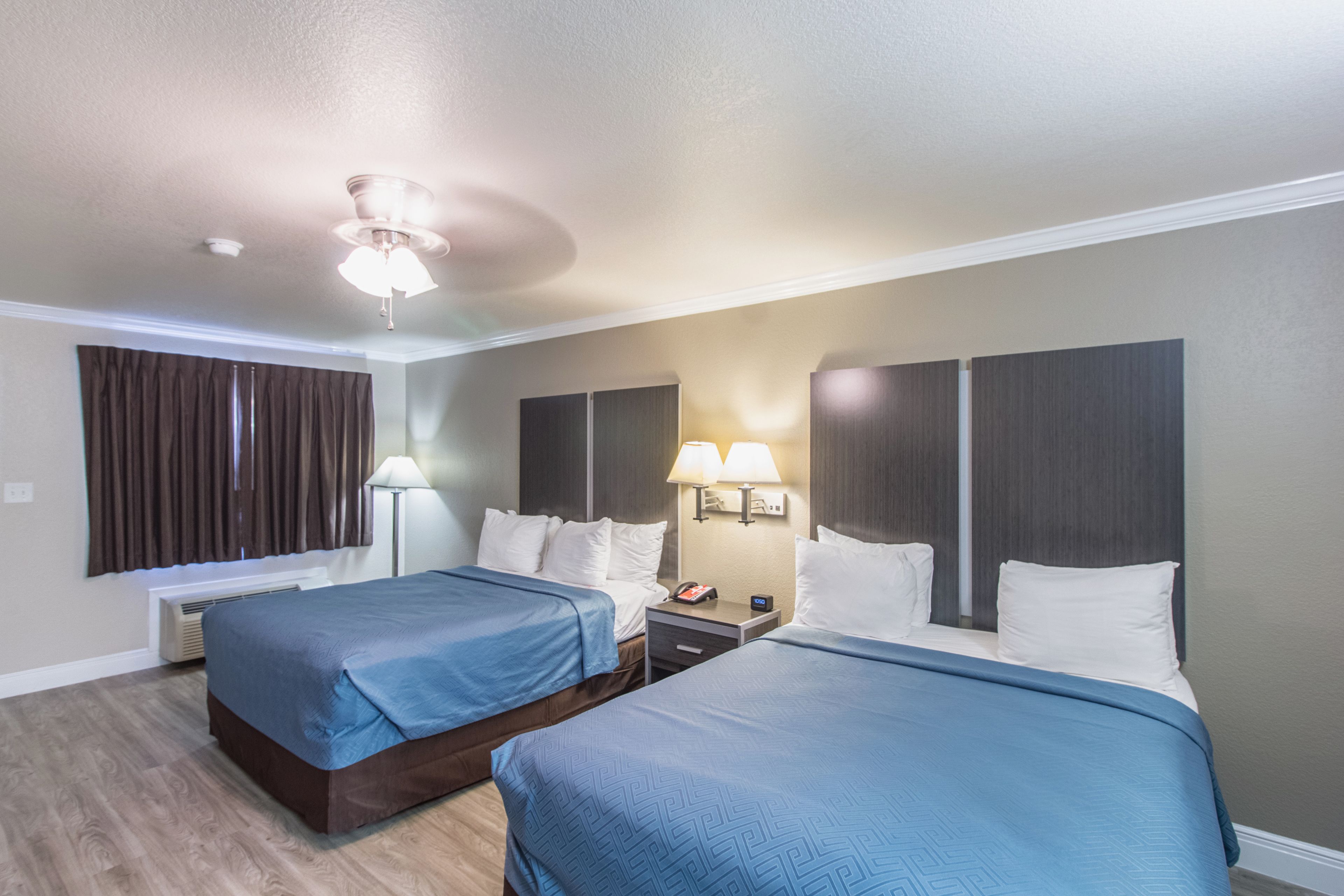 standard room, 2 queen beds, non smoking | desk, iron/ironing board, free wifi, bed sheets