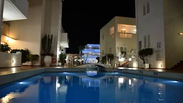 Indoor pool, 3 outdoor pools, open 9 AM to 8 PM, pool umbrellas