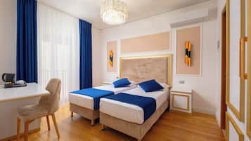 Hypo-allergenic bedding, pillow-top beds, in-room safe, desk