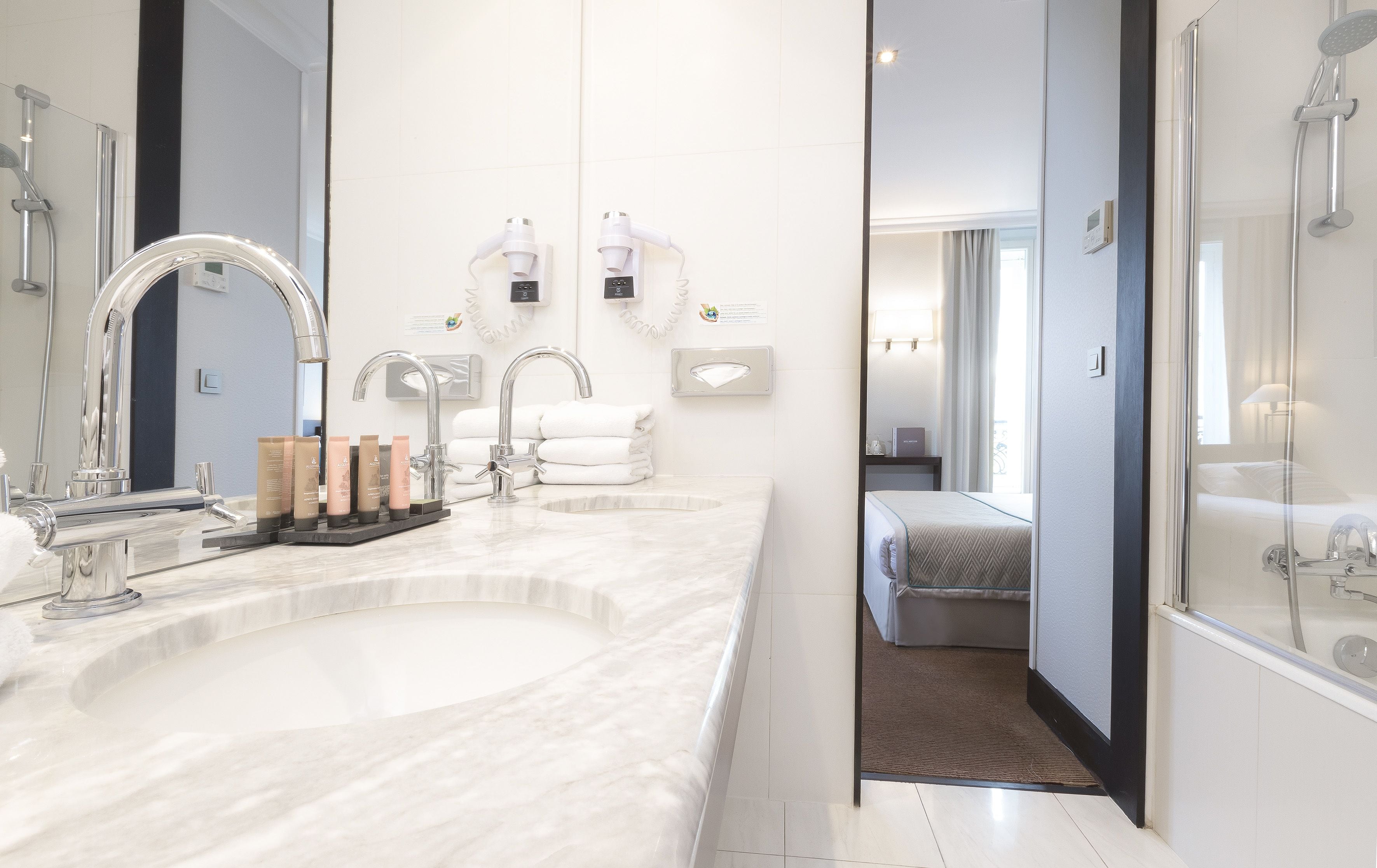 free toiletries, hair dryer, slippers, towels