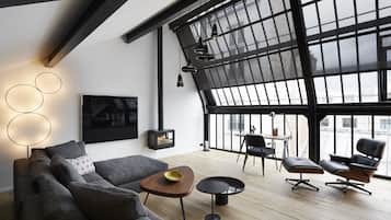 Signature-Apartment | Wohnzimmer | 102-cm-Flachbildfernseher mit Satellitenempfang, Fernseher