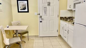 Suite, 1 King Bed, Accessible, Non Smoking (Efficiency) | Private kitchen | Fridge, microwave, stovetop, coffee/tea maker