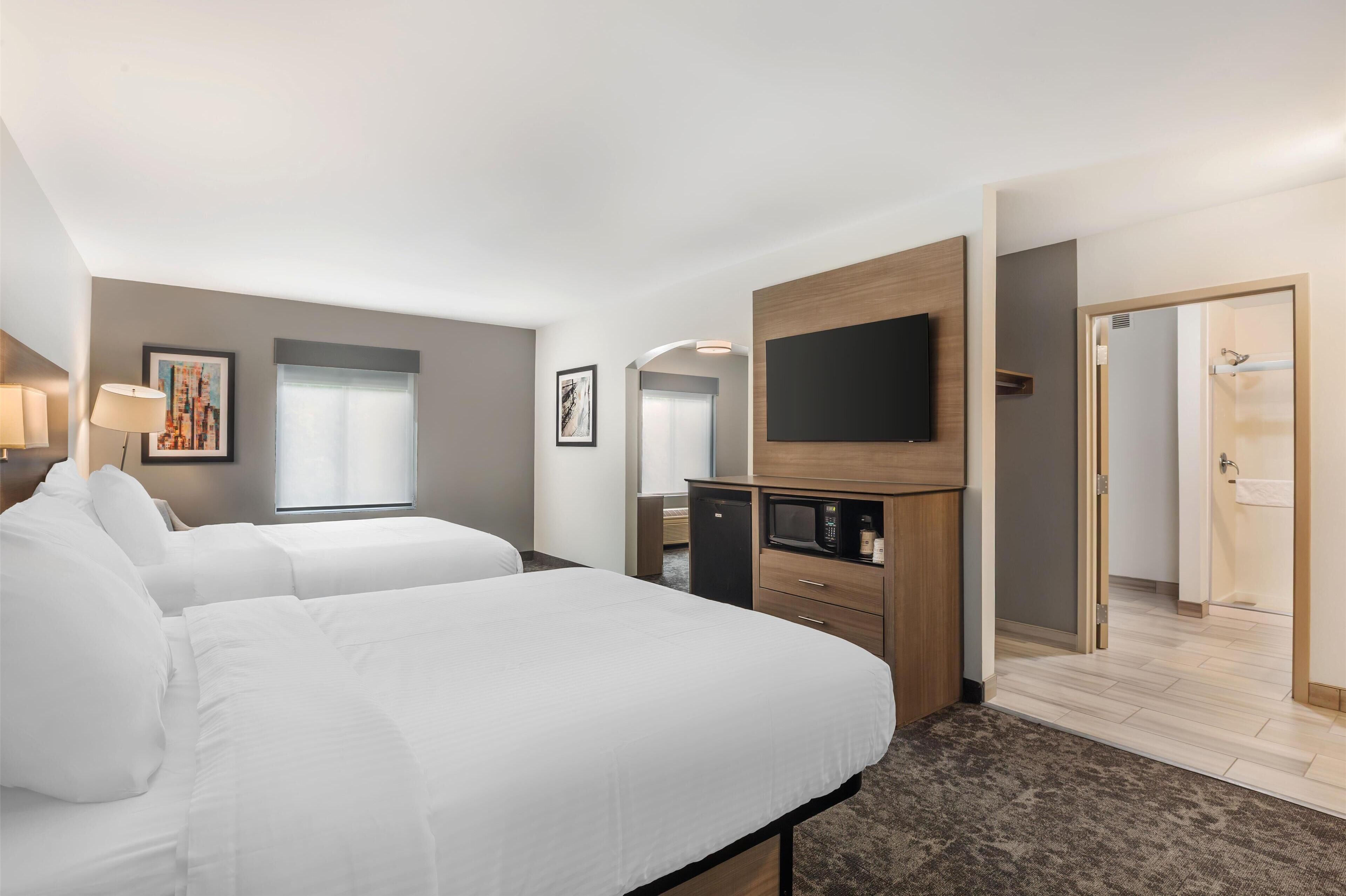 Suite, 2 Queen Beds, Non Smoking (with Single Sofabed) | Desk, laptop workspace, soundproofing, rollaway beds