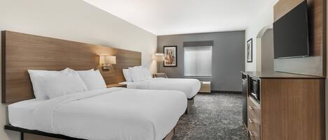 Suite, 2 Queen Beds, Non Smoking (with Single Sofabed) | Desk, laptop workspace, soundproofing, rollaway beds