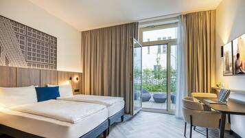 Executive Studio | 1 bedroom, hypo-allergenic bedding, in-room safe, individually decorated