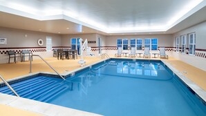 An indoor swimming pool with a checkered floor, poolside chairs, and a 'No Diving' sign. - Residence Inn by Marriott New Bedford Dartmouth (North Dartmouth)