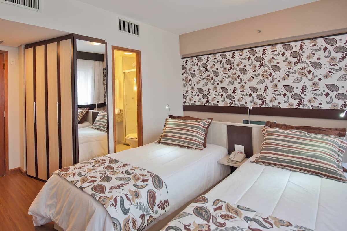 Superior Apartment, 2 Twin Beds | Minibar, in-room safe, desk, laptop workspace