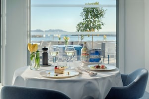 Lunch, dinner served; Mediterranean cuisine, pool views