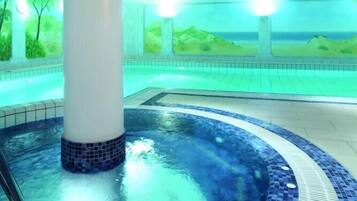 Indoor pool, outdoor pool, open 7:00 AM to 10:00 PM, pool loungers