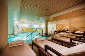 Indoor pool, outdoor pool, open 7:00 AM to 10:00 PM, pool loungers