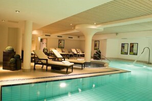 Indoor pool, outdoor pool, open 7:00 AM to 10:00 PM, pool loungers