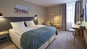 Allergivenligt sengetøj, minibar, pengeskab på værelset, skrivebord