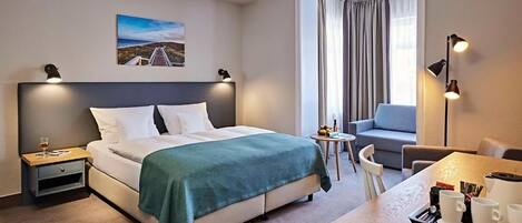 Hypo-allergenic bedding, minibar, in-room safe, desk