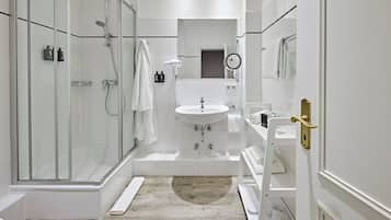 Shower, eco-friendly toiletries, hair dryer, towels