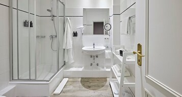 Shower, eco-friendly toiletries, hair dryer, towels