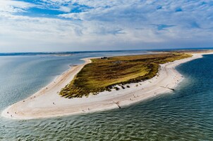 Una playa cerca, toallas de playa