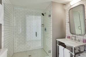 Suite, 1 Bedroom, Pool View | Bathroom | Shower, designer toiletries, hair dryer, bathrobes