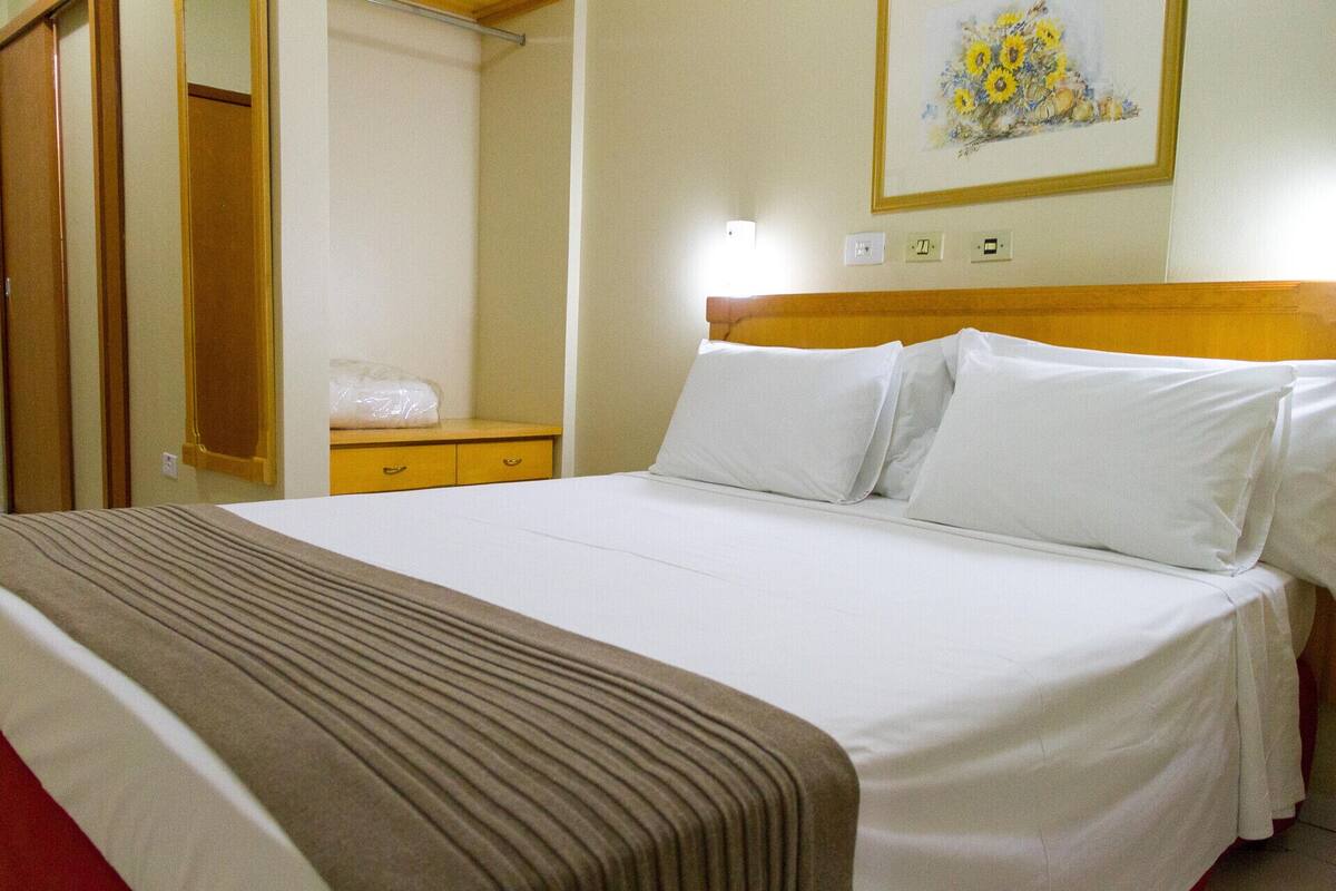 Desk, blackout drapes, WiFi (free), bed sheets