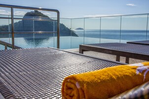 Outdoor pool, open 8 AM to 8 PM, pool umbrellas, pool loungers
